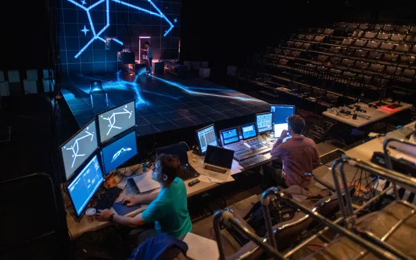 Media designers in rehearsal